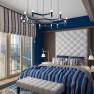 Спальня в морском стиле с ярко-синими стенами.